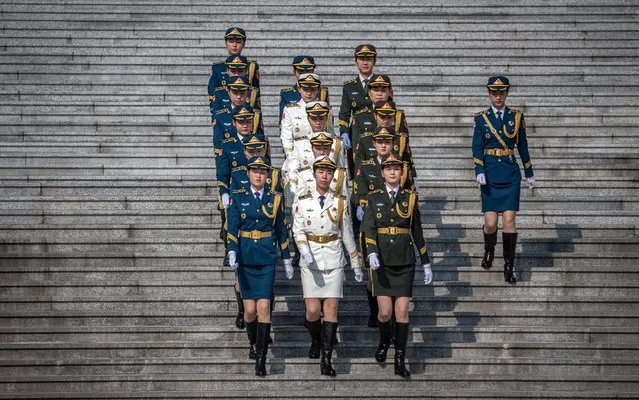 Female members of an honor guard march prior to a welcome ceremony for German Chancellor Angela Merkel at the Great Hall of the People in Beijing, China, 06 September 2019. Merkel is on a visit to China from 06 to 07 September 2019. (Photo by Roman Pilipey/EPA/EFE/Rex Features/Shutterstock)