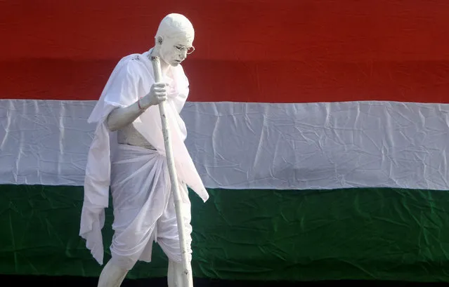 A man dressed as Mahatma Gandhi participates in the Republic Day celebrations in Chandigarh, India, January 26, 2020. (Photo by Ajay Verma/Reuters)