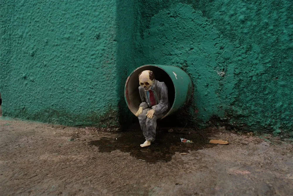 Cement Eclipses by Isaac Cordal
