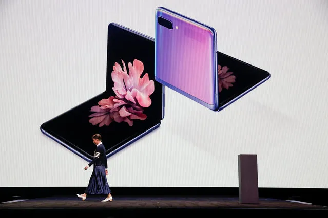 Rebecca Hirst, head of UK product marketing of Samsung Electronics, unveils the Z Flip foldable smartphone during Samsung Galaxy Unpacked 2020 in San Francisco, California, U.S. February 11, 2020. (Photo by Stephen Lam/Reuters)