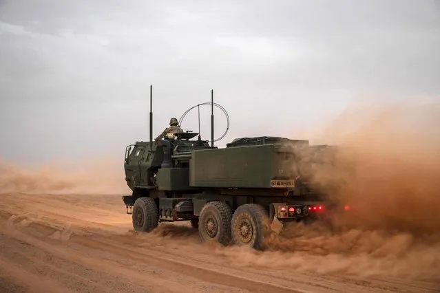 US M142 High Mobility Artillery Rocket System (HIMARS) launcher vehicle drives along in the Grier Labouihi region in Agadir, southern Morocco on June 21, 2022 during the “African Lion 2022” military exercise. (Photo by Fadel Senna/AFP Photo)