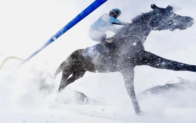 Riders and horses in action during the 'Gp Moyglare Stud' on the third weekend of the White Turf races on the frozen Lake in St. Moritz, Switzerland, 16 February 2020. (Photo by Gian Ehrenzeller/EPA/EFE/Rex Features/Shutterstock)