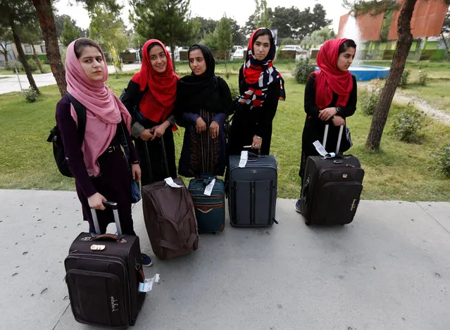 Members of Afghan robotics girls team arrive to receive their visas from the U.S. embassy in Kabul, Afghanistan July 13, 2017. (Photo by Mohammad Ismail/Reuters)