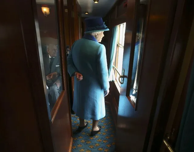 Britain's Queen Elizabeth boards her carriage as she travels on the new Scottish Borders railway line, in Scotland, September 9, 2015. Queen Elizabeth officialy opened the new Scottish Borders Railway on the day she became Britain's longest reigning monarch. (Photo by Andrew Milligan/Reuters)