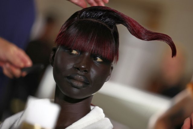 A model gets ready backstage before the Viktor & Rolf Haute Couture Fall/Winter 2024-2025 collection show in Paris, France, June 26, 2024. (Photo by Stephanie Lecocq/Reuters)