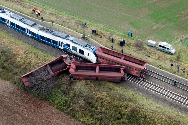 An aerial view of the crash after a passenger train collided with a freight train in Meerbusch, Germany, 06 December 2017. According to local police reports about 50 people have been injured in the crash on 05 December 2017. (Photo by Sascha Steinbach/EPA/EFE)