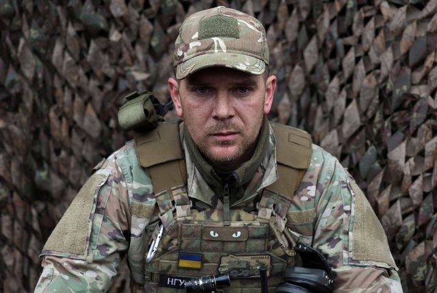 Ukrainian gunner callsign “Vojak” looks on during an interview at a position where an artillery crew of the National Guard 3rd Operational “Spartan” Brigade mans a Bohdana self-propelled howitzer at an undisclosed location in the Donetsk frontline, part of the Pokrovsk defence line in Ukraine, on April 6, 2025. (Photo by Violeta Santos Moura/Reuters)