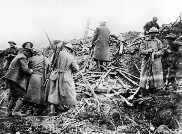 Victorious British and French troops capture the ruins of St.Pierre Division on November 13th 1916. (Photo by Camera Press/IWM)