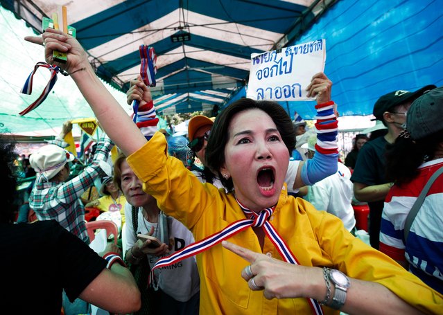 Protesters shout slogans during a rally calling for the resignation of the Thai prime minister near the Government House in Bangkok, Thailand, 19 June 2025. A group of anti-Shinawatra protesters held a rally to call for the resignation of the prime minister following the leaked audio of her phone call with former Cambodian premier Hun Sen regarding the countries' border dispute. (Photo by Rungroj Yongrit/EPA/EFE)