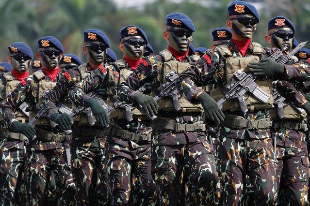 Indonesian police personnel march during a ceremony to mark the 79th anniversary of Indonesia's National Police at the National Monument in Jakarta, Indonesia, on July 1, 2025. (Photo by Ajeng Dinar Ulfiana/Reuters)