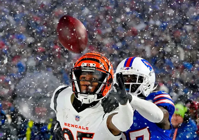 Buffalo Bills cornerback Tre'Davious White (27) breaks up a pass and was penalized for pass interference against Cincinnati Bengals wide receiver Tee Higgins (85) during the fourth quarter of an AFC divisional round game at Highmark Stadium in Orchard Park, New York on January 22, 2023. (Photo by Gregory Fisher/USA TODAY Sports)