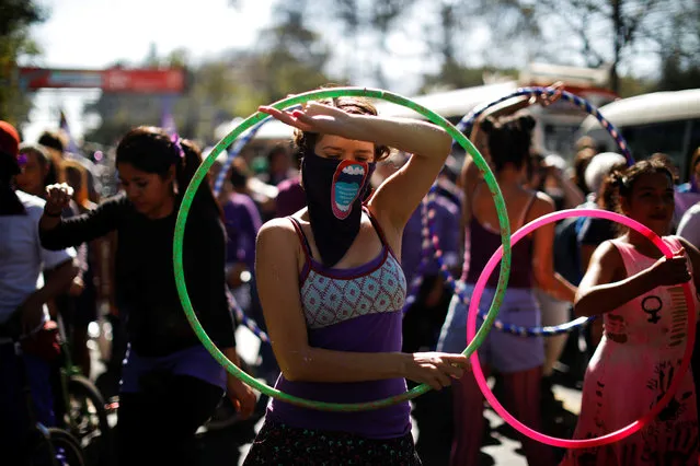 Activists participate in a march to call for an end to violence against women during International Women's Day in San Salvador, El Salvador, March 8, 2018. (Photo by Jose Cabezas/Reuters)