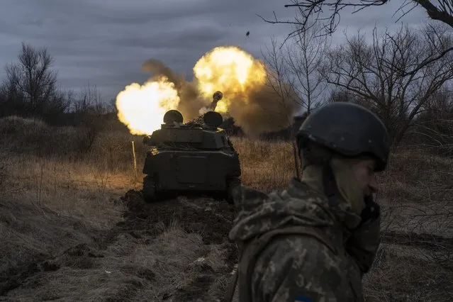 A Ukrainian self-propelled artillery vehicle fires on the frontline, Donetsk region, Ukraine, Thursday, March 2, 2023. (Photo by Iryna Rybakova/AP Photo)