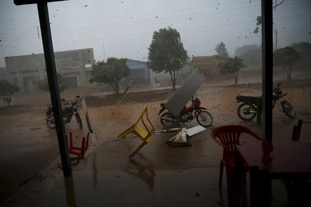 Rio Pardo, next to Bom Futuro National Forest, during a tropical storm in the district of Porto Velho, Rondonia State, Brazil, August 30, 2015. (Photo by Nacho Doce/Reuters)