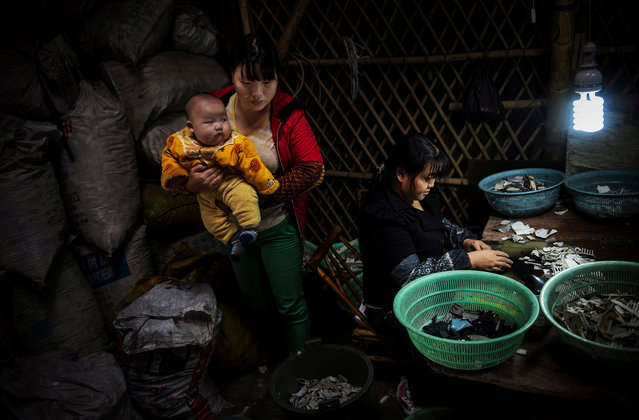 Guiyu, in Guangdong province, southern China, was described as the e-waste capital of the world, before it disappeared last year. A study of children in Guiyu found that they had abnormally high amounts of lead in their blood. (Photo by Kai Loeffelbein/laif Agentur)