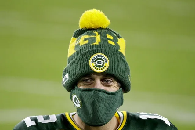 Green Bay Packers' Aaron Rodgers wears a mask after an NFL football game against the Philadelphia Eagles Sunday, December 6, 2020, in Green Bay, Wis. The Packers won 30-16. (Photo by Mike Roemer/AP Photo)