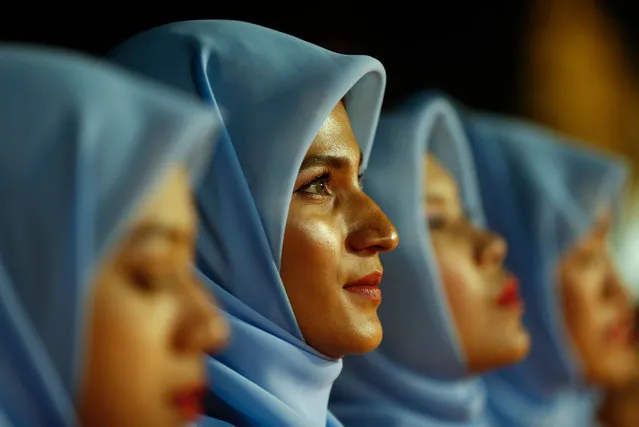 Muslim girls take part the Interreligious Gathering of Prayer for Peace ceremony in Yangon, Myanmar, 31 October 2017. Aung San Suu Kyi's National League for Democracy (NLD) party staged a demonstration of Interreligious Gathering of Prayer for Peace ceremony. (Photo by Lynn Bo Bo/EPA/EFE)