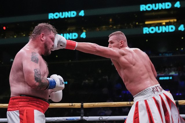 Poland's Damian Knyba, right, punches Joey Dawejko during the third round of a heavyweight boxing match Saturday, October 18, 2025, at Barclays Center in New York. (Photo by rank Franklin II/AP Photo)