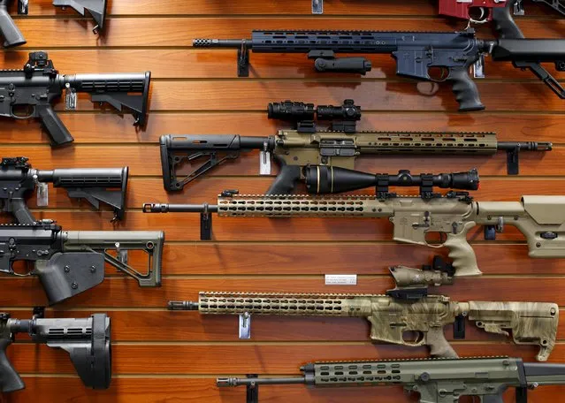 Firearms are shown for sale at the AO Sword gun store in El Cajon, California, January 5, 2016. President Barack Obama said on Monday his new executive actions to tighten gun rules were "well within" his legal authority and consistent with the U.S. right to bear arms, a warning to opponents who are likely to challenge them in court. (Photo by Mike Blake/Reuters)