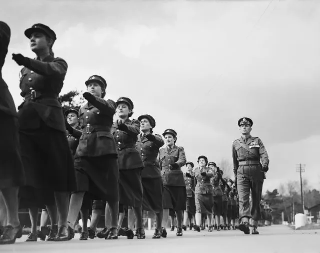 Members of the Queen Alexandra's Royal Army Nursing Corps march to their depot at Hindhead, Surrey, where they will take part in a ceremonial parade to mark Corps Day, 13th April 1953. (Photo by Douglas Miller/Keystone/Hulton Archive/Getty Images)