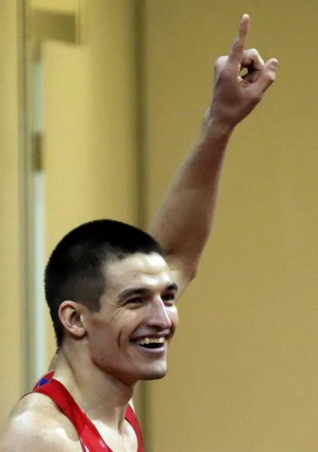 Ilya Shkurenyov of Russia celebrates after competing in the men's heptathlon 60 metres hurdles event during the IAAF European Indoor Championships in Prague March 8, 2015. REUTERS/David W Cerny (CZECH REPUBLIC  - Tags: SPORT ATHLETICS)  