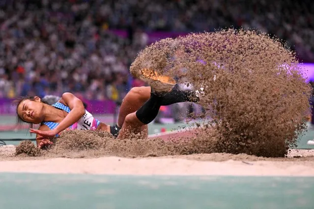 Hong Kong's Yue Nga Yan competes in the women's long jump final athletics event during the 2022 Asian Games in Hangzhou in China's eastern Zhejiang province on October 2, 2023. (Photo by William West/AFP Photo)