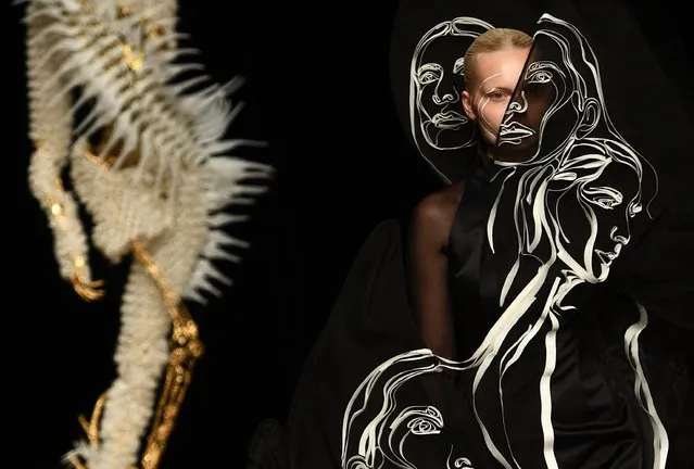 A model presents a creation by Dutch fashion designer Iris Van Herpen during the Women's Haute-Couture Spring-Summer 2023 Fashion Week in Paris on July 4, 2022. (Photo by Christophe Archambault/AFP Photo)