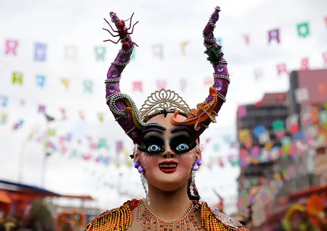 A China Supay member of Diablada group performs during the carnival parade in Oruro, Bolivia February 25, 2017. (Photo by David Mercado/Reuters)