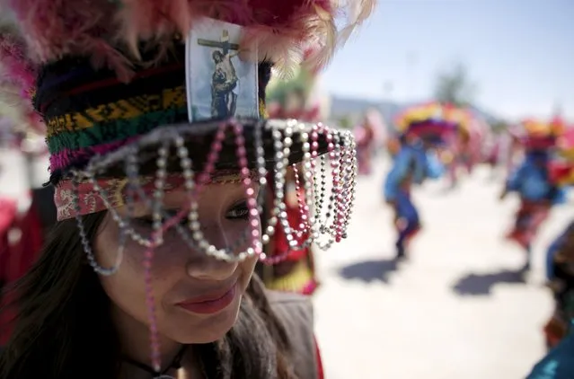 A Matachin dancer participates in a religious festival in Saltillo, Mexico, April 17, 2016. (Photo by Daniel Becerril/Reuters)