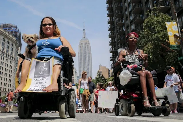 People take part in the disability pride parade in New York, July 12, 2015. (Photo by Eduardo Munoz/Reuters)