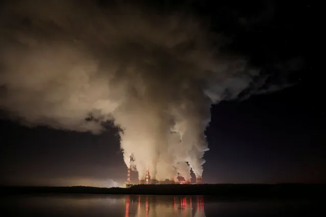 Smoke and steam billows from Belchatow Power Station, Europe's largest coal-fired power plant operated by PGE Group, at night near Belchatow, Poland December 5, 2018. (Photo by Kacper Pempel/Reuters)