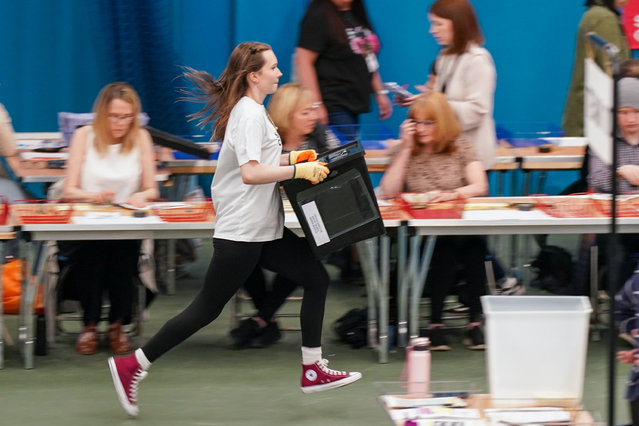 Ballot boxes arrive at Silksworth Community Pool, Tennis and Wellness Centre in Sunderland as the verification and count process begins in the Parliamentary constituency counts for Houghton and Sunderland South, Sunderland Central and Washington and Gateshead South on July 04, 2024 in Sunderland, England. For a quarter of a century, Sunderland has been able to count their votes at record speed delivering the first result of the night at six successive general Elections. (Photo by Ian Forsyth/Getty Images)