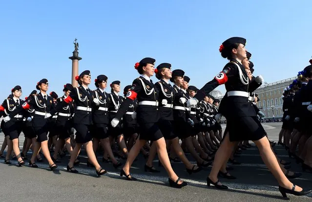 Russian servicewomen march during a Victory Day parade rehearsal on Dvortsovaya (Palace) Square in central Saint Petersburg on April 26, 2019. Russia marks the 74th anniversary of the Soviet Union's victory over Nazi Germany in World War Two on May 9. (Photo by Olga Maltseva/AFP Photo)