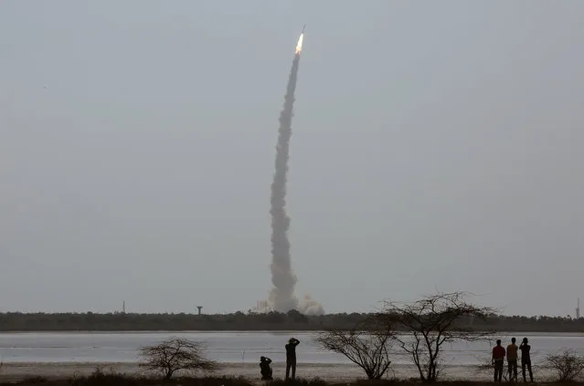 India's Polar Satellite Launch Vehicle (PSLV) C38, carrying Cartosat-2 and 30 other satellites, lifts off from the Satish Dhawan Space Centre in Sriharikota, June 23, 2017. (Photo by P. Ravikumar/Reuters)