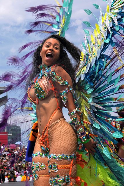 A reveller takes part in the Toronto Caribbean Carnival, on Saturday, August 5, 2023. (Photo by Canadian Press/Rex Features/Shutterstock)