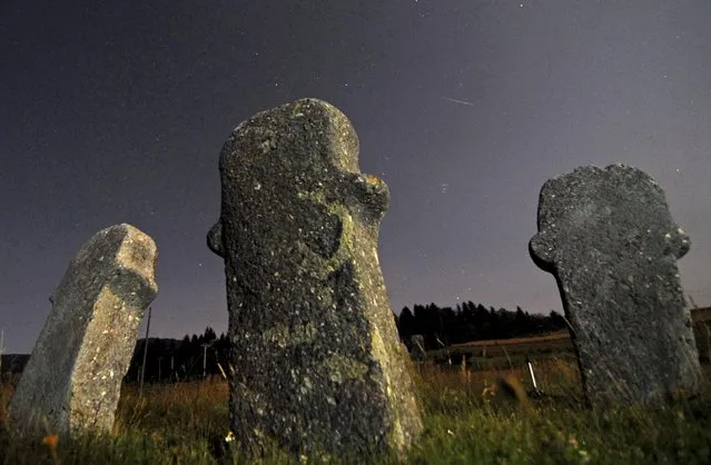 A meteor streaks over the sky during the Perseid meteor shower at the Maculje archaeological site near Novi Travnik August 12, 2014. According to NASA, the annual Perseid meteor shower reaches its peak on August 12 and 13 in Europe. The fireballs from the meteorites are fast and plentiful, although a nearly full moon (Supermoon) makes it difficult to view them this year, the agency adds. (Photo by Dado Ruvic/Reuters)