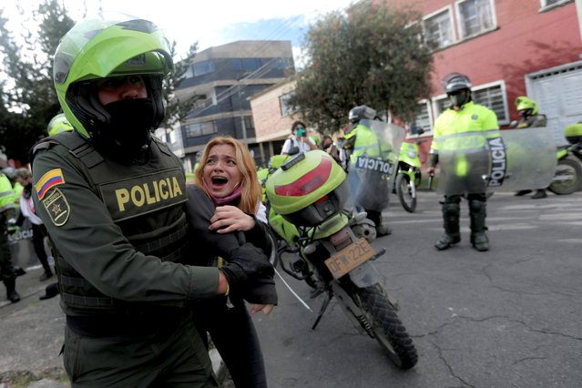 A demonstrator is detained by police officers, during a protest among a series of ongoing demonstrations calling for dignified life, amidst an outbreak of the coronavirus disease (COVID19), in Bogota, Colombia on June 15, 2020. (Photo by Luisa Gonzalez/Reuters)