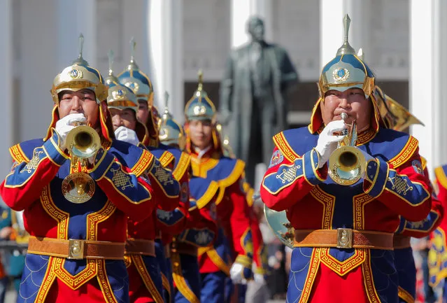 Members of the Honour Guard and the central military band of the Mongolian armed forces perform during the International Military Orchestra Music Festival “Spasskaya Tower” at the Exhibition of Achievements of National Economy (VDNH) in Moscow, Russia August 27, 2016. (Photo by Maxim Shemetov/Reuters)