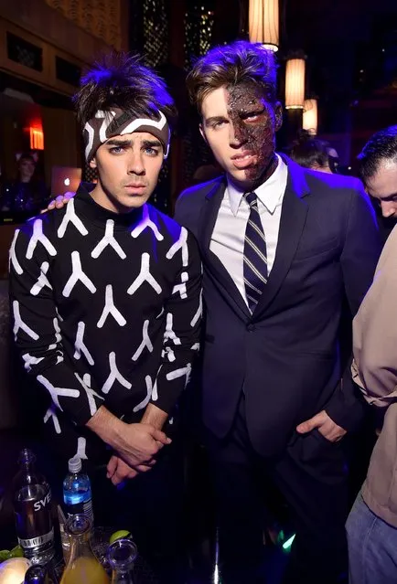 Joe Jonas and Nolan Gerard Funk attend Moto X presents Heidi Klum's 15th Annual Halloween Party sponsored by SVEDKA Vodka at TAO Downtown on October 31, 2014 in New York City. (Photo by Mike Coppola/Getty Images for Heidi Klum)