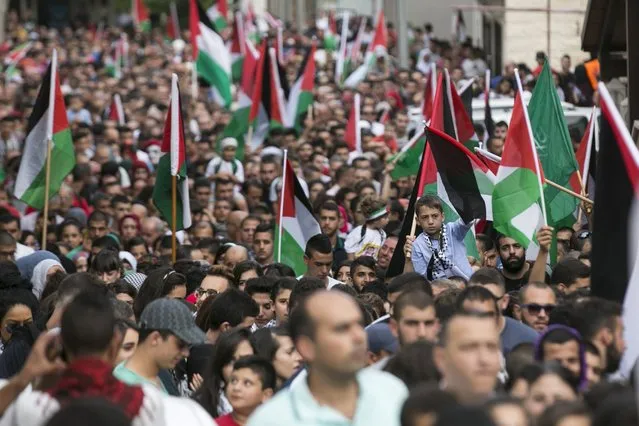 Israeli Arabs take part in a pro-Palestinian rally in the northern Israeli town of Sakhnin October 13, 2015. (Photo by Baz Ratner/Reuters)
