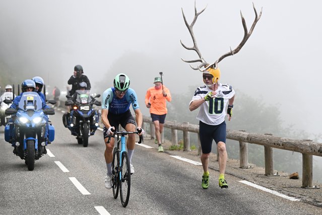 Felix Gall of Austria and Team Decathlon AG2R La Mondiale competes in the chase group while fans cheer during the 112th Tour de France 2025, Stage 14 a 182.6km stage from Pau to Luchon-Superbagneres 1794m / #UCIWT / on July 19, 2025 in Luchon-Superbagneres, France. (Photo by Tim de Waele/Getty Images)