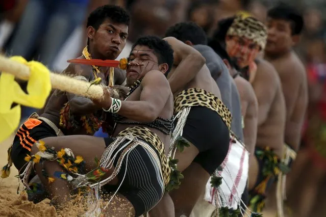 Indigenous people compete during a tug-of-war competition at the first World Games for Indigenous Peoples in Palmas, Brazil, October 25, 2015. (Photo by Ueslei Marcelino/Reuters)