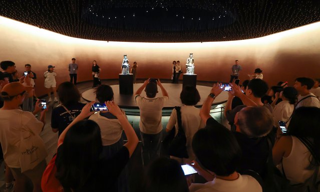 On August 3, 2025, visitors to the National Museum of Korea's private room in Yongsan-gu, Seoul, repeatedly took pictures of the Bangasayusang. The Bangasayusang is widely acknowledged to be one of the finest Buddhist sculptures ever produced and is a masterpiece of Korean art. (Phoot by Jang Gyeong-sik)