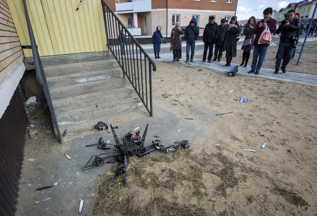 A drone which was to carry a 2kg package from Ulan- Ude to the village of Nizhny Sayantui seen after a crashin during test launch in Ulan-Ude, the capital city of the Republic of Buryatia, Russia on April 2, 2018. The multicopter can fly at a speed of up to 70 km/ h to a distance up to 60 km; the Russian Post is to start using drones to deliver packages to remote areas. (Photo by Anna Ogorodnik/Reuters)