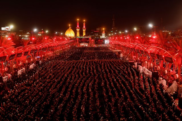Shi'ite pilgrims pray gather between the Imam Hussein and Imam Abbas shrines ahead of Ashura, the holiest day on the Shi'ite Muslim calendar, in the holy city of Kerbala, Iraq, on July 5, 2025. (Photo by Alaa al-Marjani/Reuters)