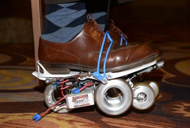 The Rollkers, a transportation accessory that increases a person's average walking rate up to 7 miles per hour, is seen on January 4, 2014 before the start of the 2015 Consumer Electronics Show in Las Vegas, Nevada.  2015 International CES, the world's largest showcase for the latest in consumer electronics, runs on January 6-9, with media preview days on January 4 and 5. (Photo by Robyn Beck/AFP Photo)
