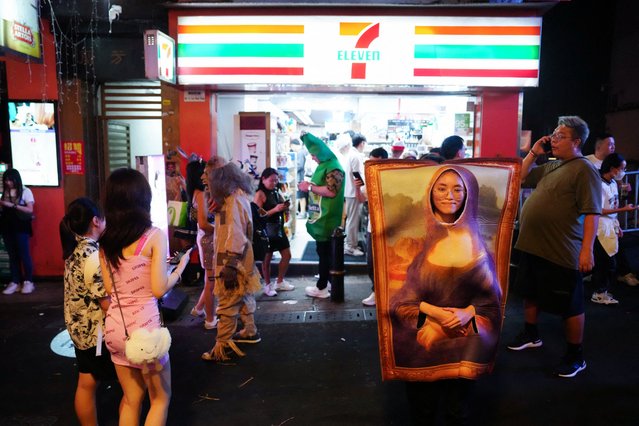 People wear costumes to celebrate Halloween at Lan Kwai Fong, a popular nightlife destination in Central, Hong Kong, China on October 31, 2025. (Photo by Lam Yik/Reuters)