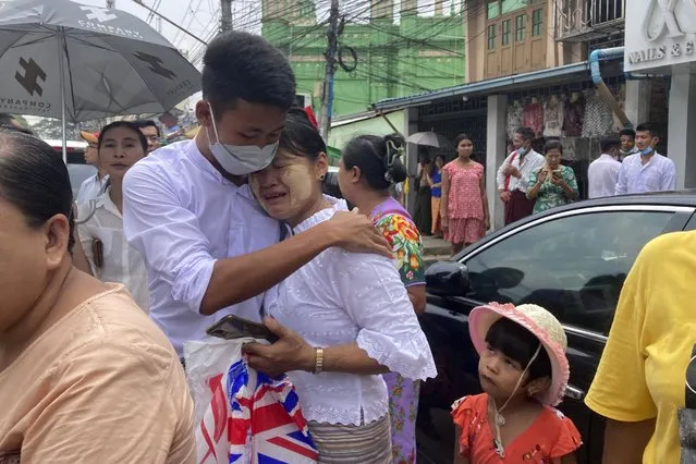 A man is welcomed by his mother after his release from Insein Prison in Yangon, Myanmar Wednesday, May 3, 2023. Myanmar’s ruling military council says it is releasing more than 2,100 political prisoners as a humanitarian gesture. Thousands more remain imprisoned on charges generally involving nonviolent protests or criticism of military rule, which began when the army seized power in 2021. (Photo by Thein Zaw/AP Photo)