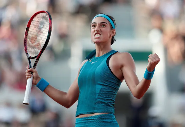 France' s Caroline Garcia celebrates after victory over China' s Peng Shuai during their women' s singles second round match on day five of The Roland Garros 2018 French Open tennis tournament in Paris on May 31, 2018. (Photo by Benoit Tessier/Reuters)