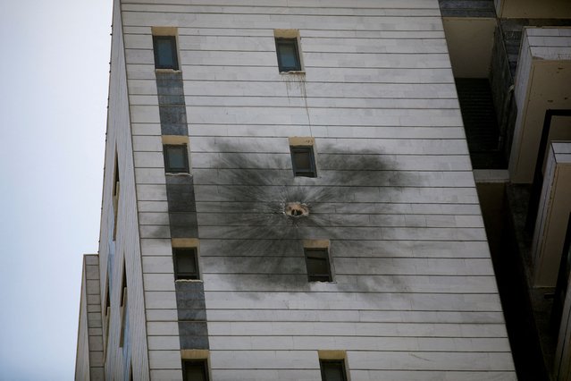 A view shows a damaged residential building, after projectiles attack towards Israel from Lebanon, amid cross-border hostilities between Hezbollah and Israeli forces, in Nahariya, northern Israel on September 9, 2024. (Photo by Shir Torem/Reuters)